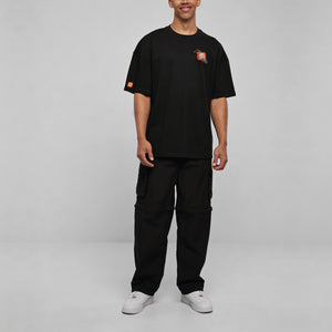 Oversized Tee Urban Flux model zwart front compleet