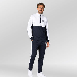 Univi Kwart rits sweatshirt model navy-white met handen in de zakken