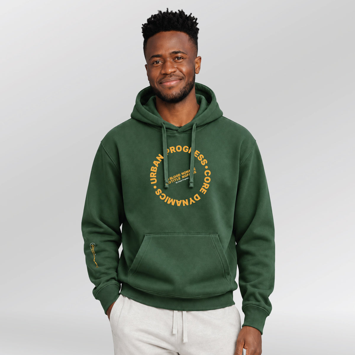 Hoodie-Core-Dynamics-model-bottle-green-front Urben Progress