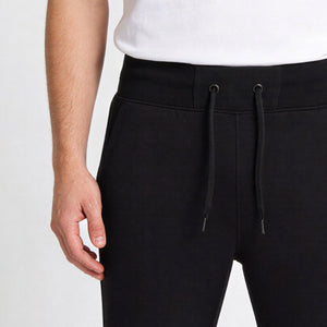 Stealth Tapered Joggingbroek model zwart detail van de band en koortjes