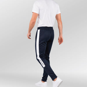Univi-Trainingsbroek-model-blauw-wit-back-lopend