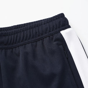 Univi Trainingsbroek model blauw-wit close-up tailleband
