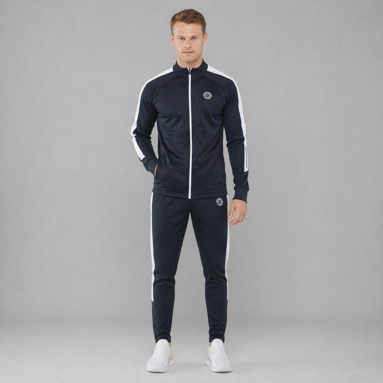 Univi Trainingsbroek model blauw-wit front met trainingsjas 