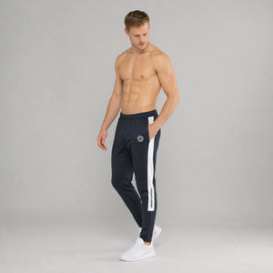 Univi Trainingsbroek model blauw-wit front side full blood bovenlijf